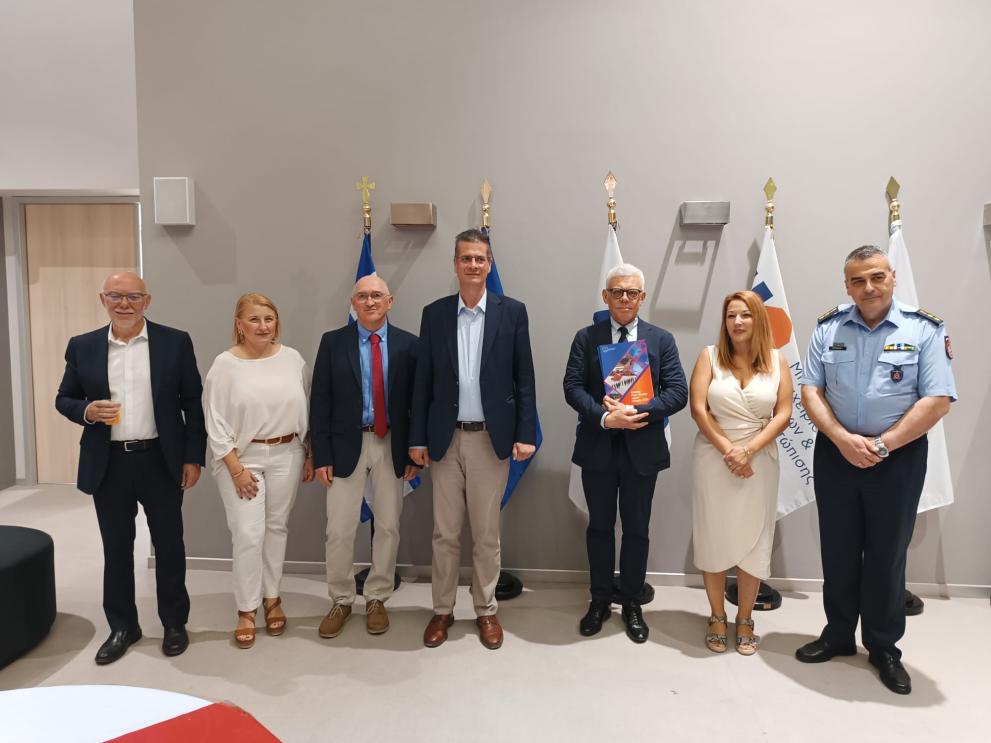 Maciej Popowski in Greece with other participants presenting the UCPM Wildfire Peer Review Report  handed over to Greek authorities.