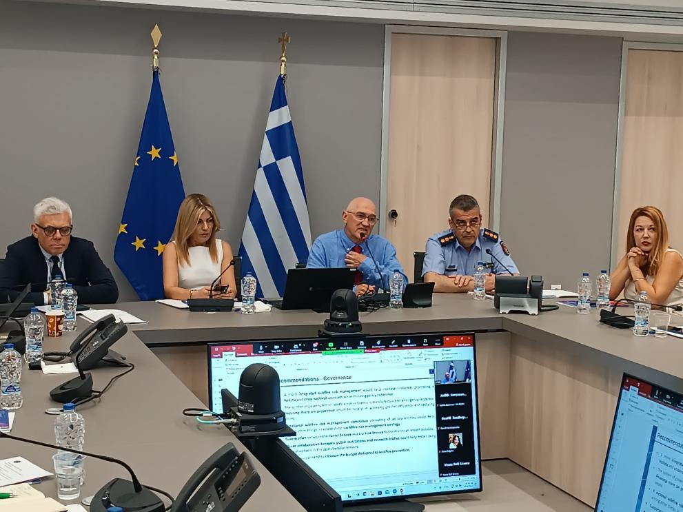 Maciej Popowski in Greece with other participants presenting the UCPM Wildfire Peer Review Report  handed over to Greek authorities.