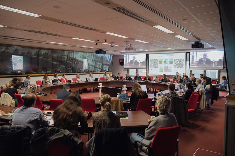 Conference room with attendees and speakers of the Cities in Action event