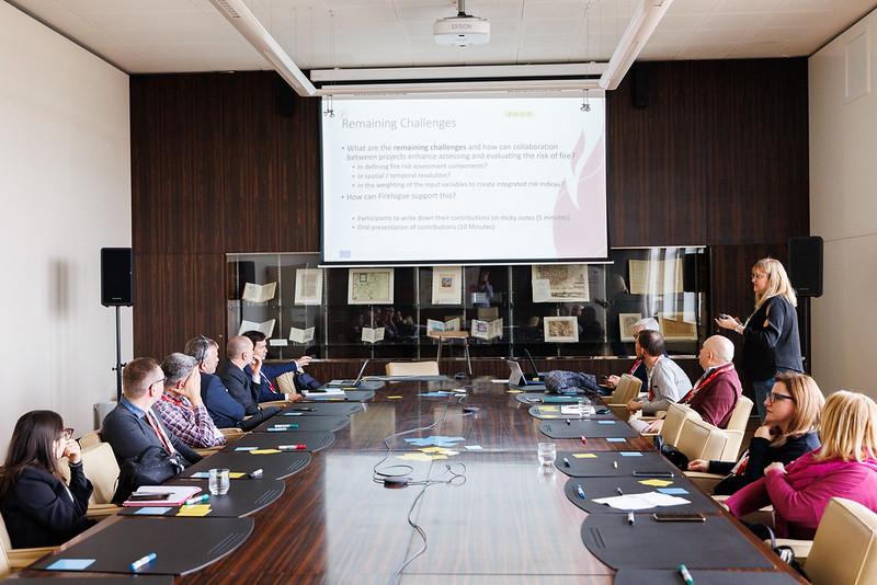 People around a meeting table.
