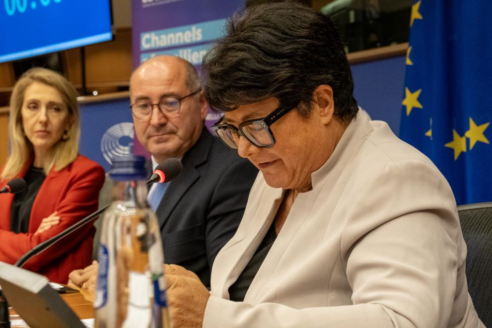 Sabine Verheyen speaking at the event. She is seated next to MEP Hélder Sousa Silva.