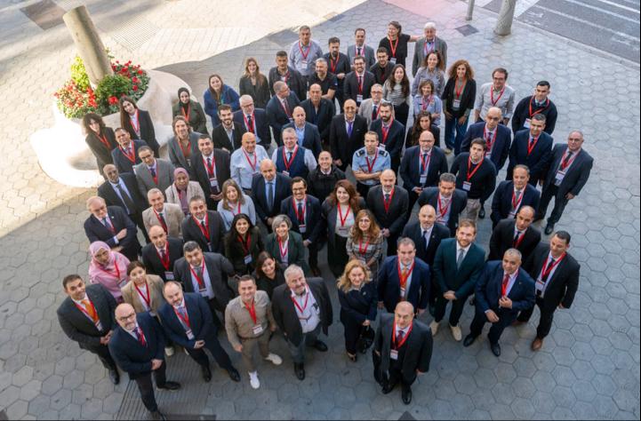 Participants to the workshop gathered outside for a group picture as seen from above.