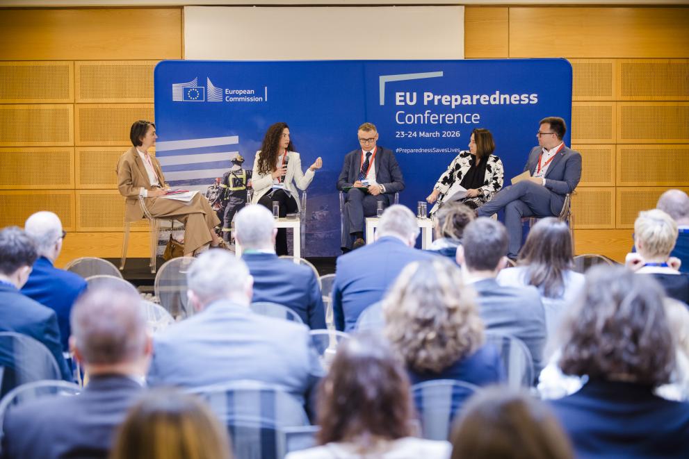 Panel on during EU Preparedness Conference, four panelists seated on stage.