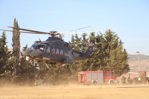 Helicopter lifting off during a civil protection exercise