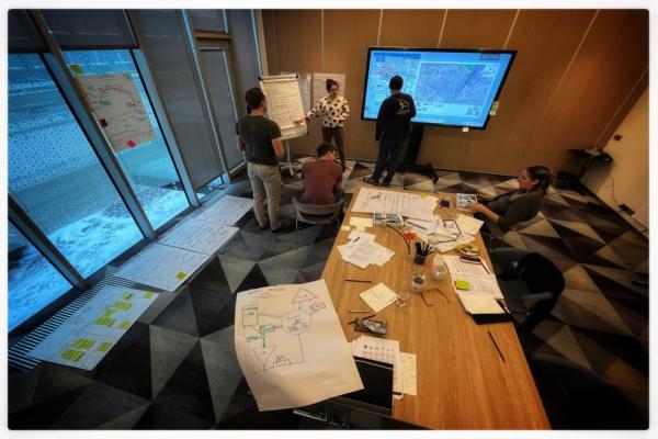 A group of workshop participants brainstorming