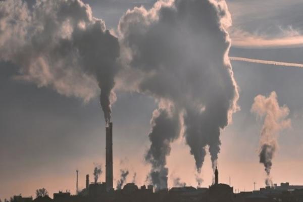 Smoke leaving industrial chimneys