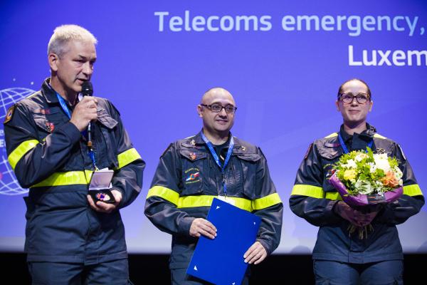 French team receives medal for extraordinary contribution