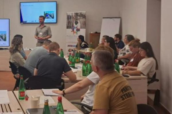 Participants during a meeting and workshop.