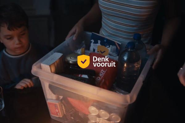 an emergency kit of a family in a candle lit room