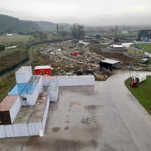 Overview picture of the Kosovo Search and Rescue training centre with different facilities, such as simulated traffic accident site, earthquake rubble, containers, etc.