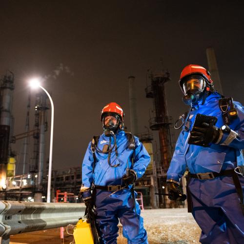 Two participants at a CBRN exercise in France