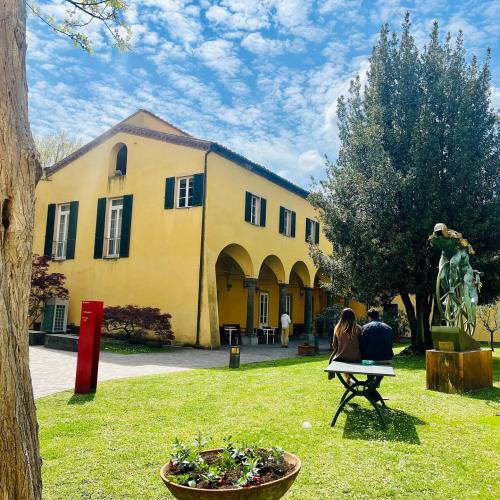 Campus buildings of the Sant'Anna School of Advanced Studies in Pisa, Italy on a summer day