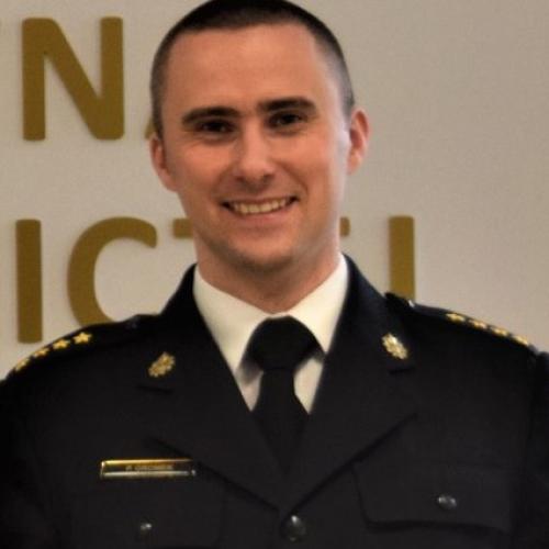 Portrait photo of fire officer in formal uniform