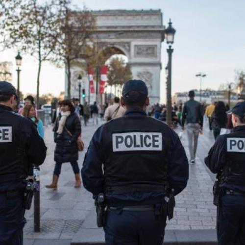 Three policemen in the streets of Paris 