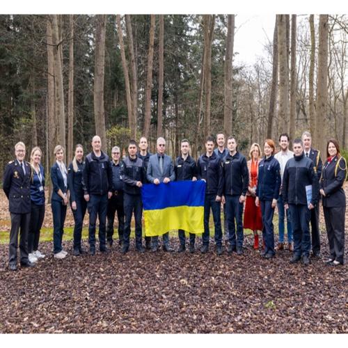 All participants of the Exchange of Experts on 2 April 2024 standing next to the National Firefighter memorial in Arnhem.