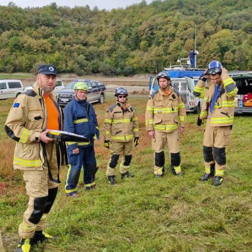 The Slovenian team deployed via the EU Civil Protection Mechanism discussing their operations.   