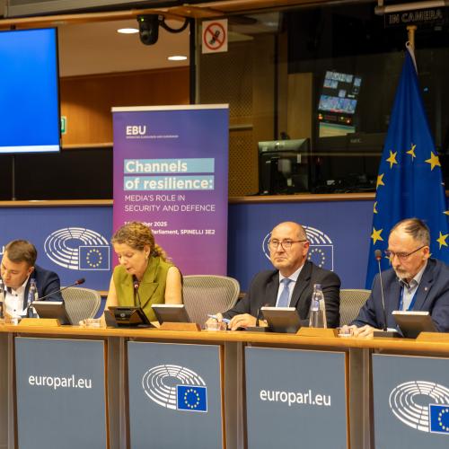 Cilla Benkö speaking in the panel during her keynote at the event. She is seated next to Mykola Chernotytskyi and Hélder Sousa Silva.