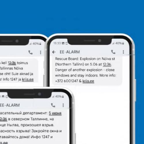 Three phones showing different alert messages in different languages.