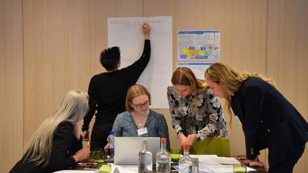 Team 'India' working together during the Simulation Exercise EUCPT Information Management. © European Union 2023