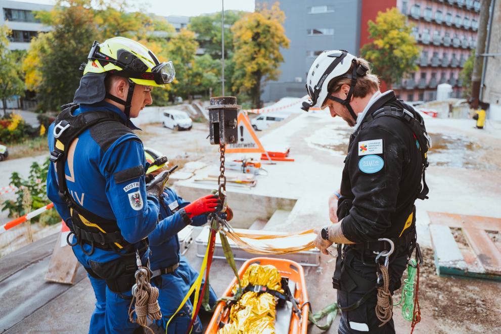 Team members from LT EMT and AT LUSAR are shown.