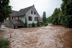 Houses flooded by an overflowing river in Erdorf, Germany, Thursday, July 15, 2021. Steady rains flooded villages and basements in Rhineland-Palatinate, southwestern Germany. (Harald Tittel/dpa via AP) (ASSOCIATED PRESS)