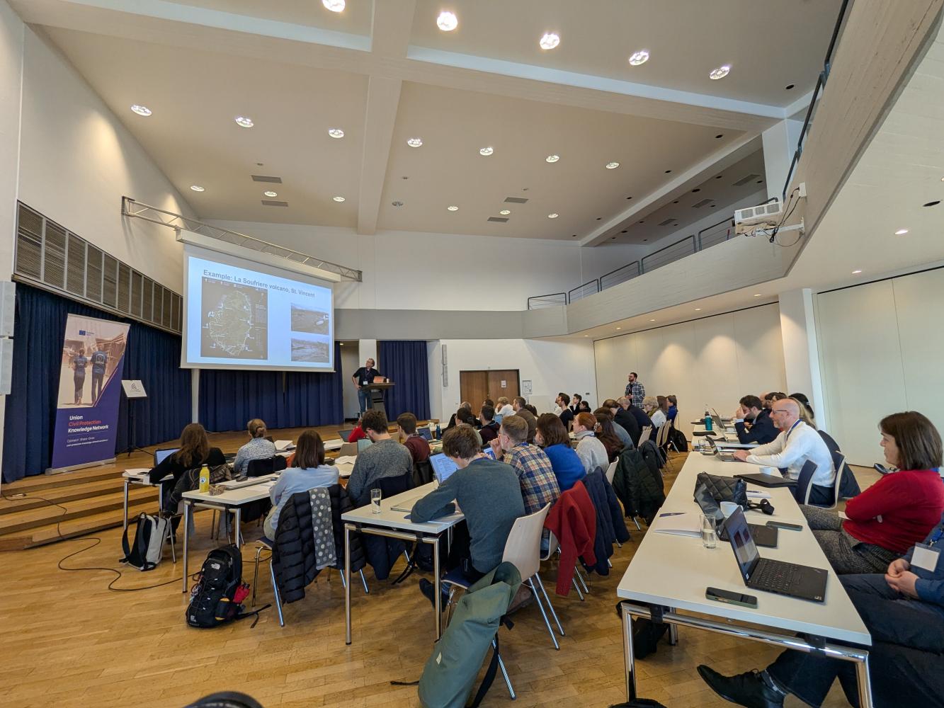 The picture shows the participants during a lecture.