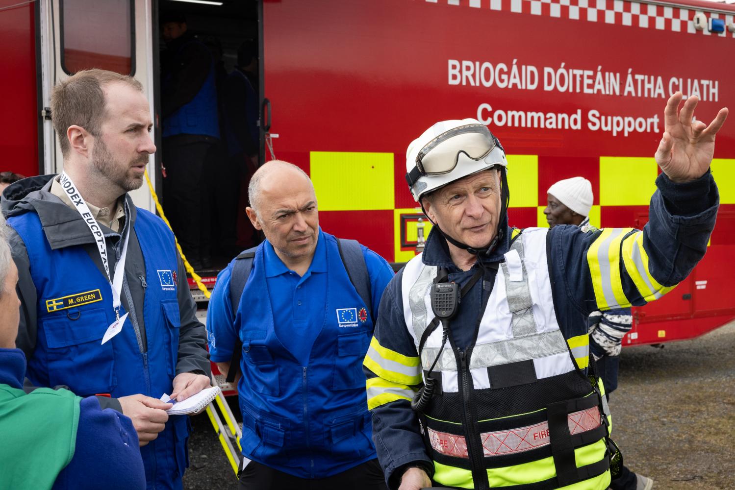 EUCPT experts with fire fighter