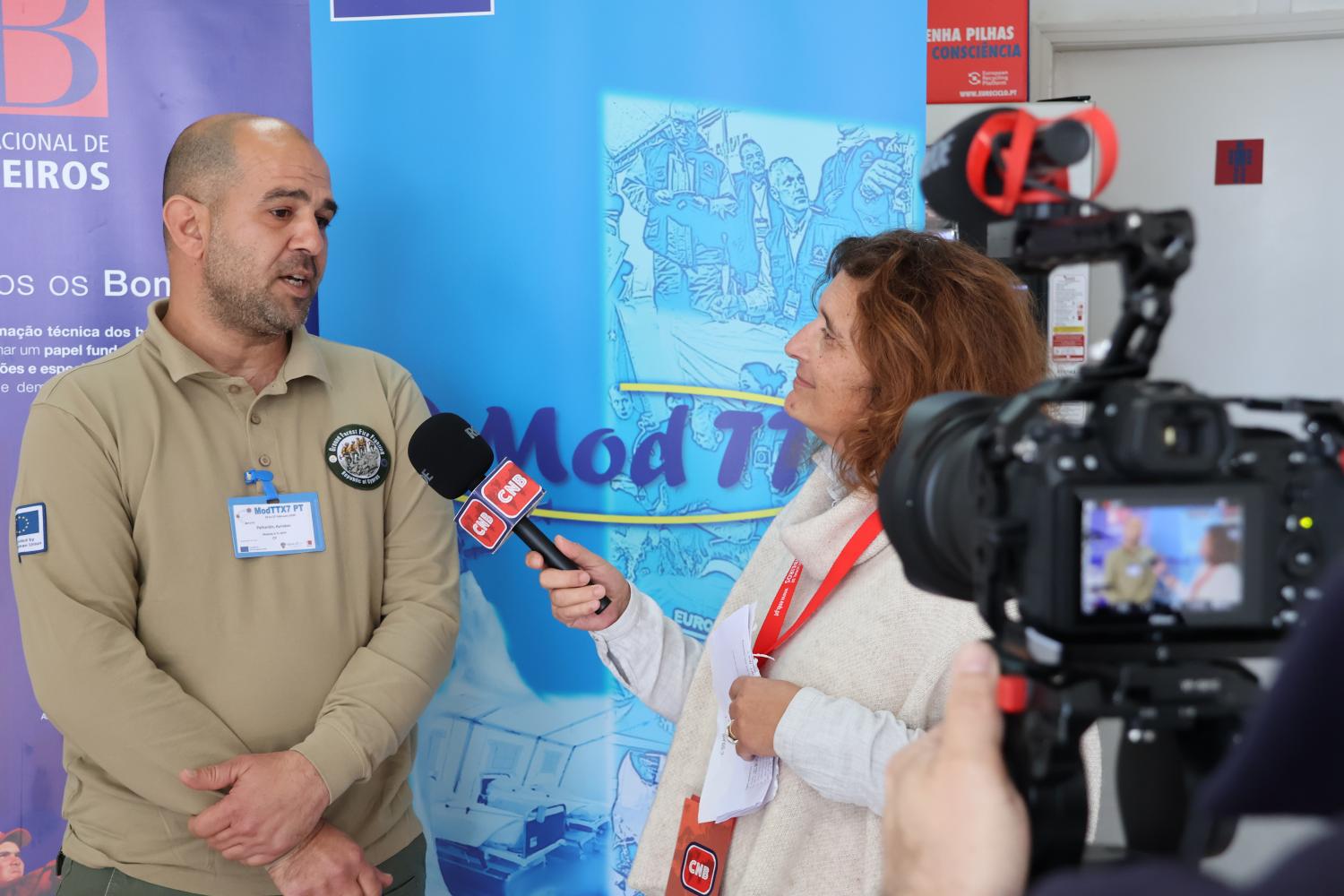 Participants are interviewed by local media (roleplayed in exercise).