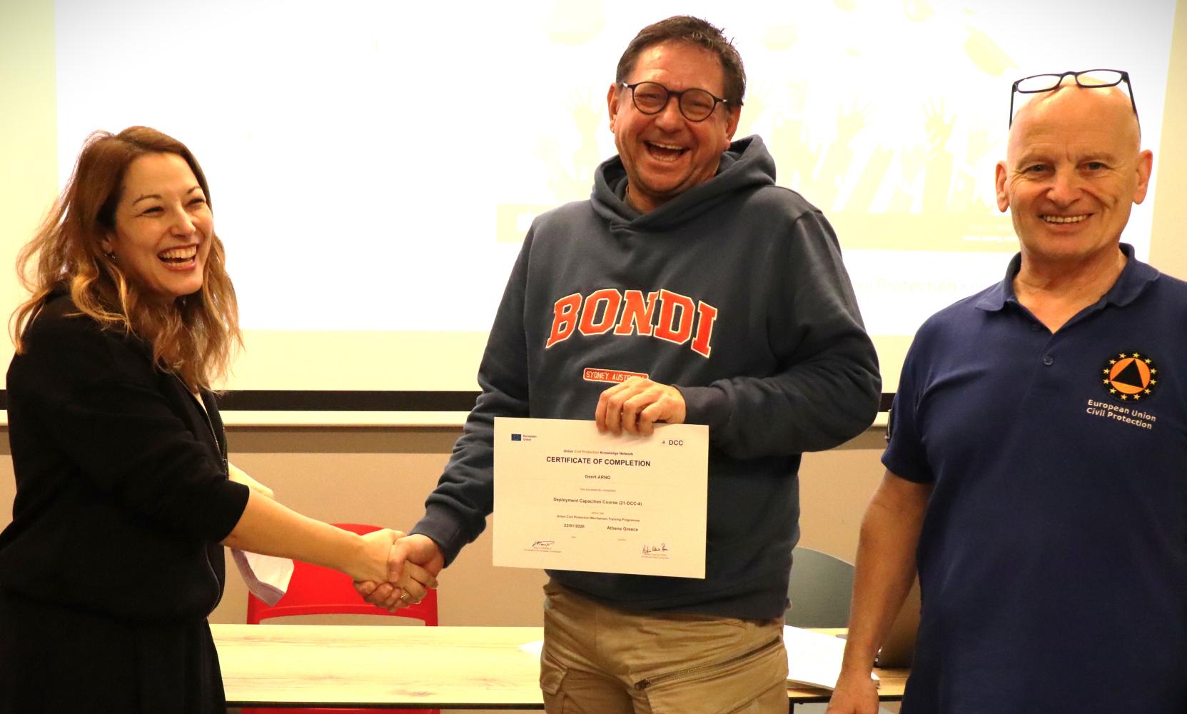 Deployment Capacities Course in Athens: Award Ceremony for Geert Arno from the Netherlands with Eirini Krampi of the Greek Directorate for Civil Protection and DCC Course Director Andreas Hattinger
