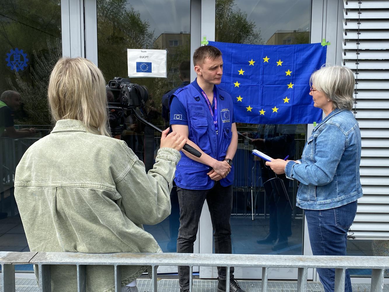 Participants are interviewed by the local media.