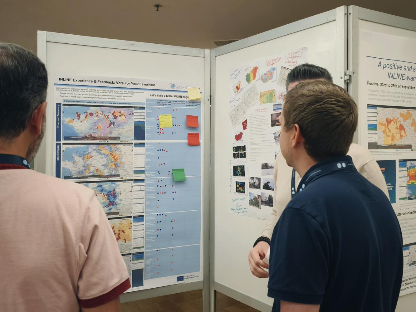 Stakeholders and project's partners discuss scientific displays and technical breakthroughs during the dedicated poster session at the INLINE workshop in Lisbon.