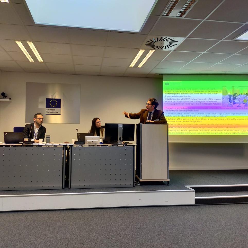 The image depicts Giovanni Besio, prompt project manager, presenting the project during the Kick-off meeting