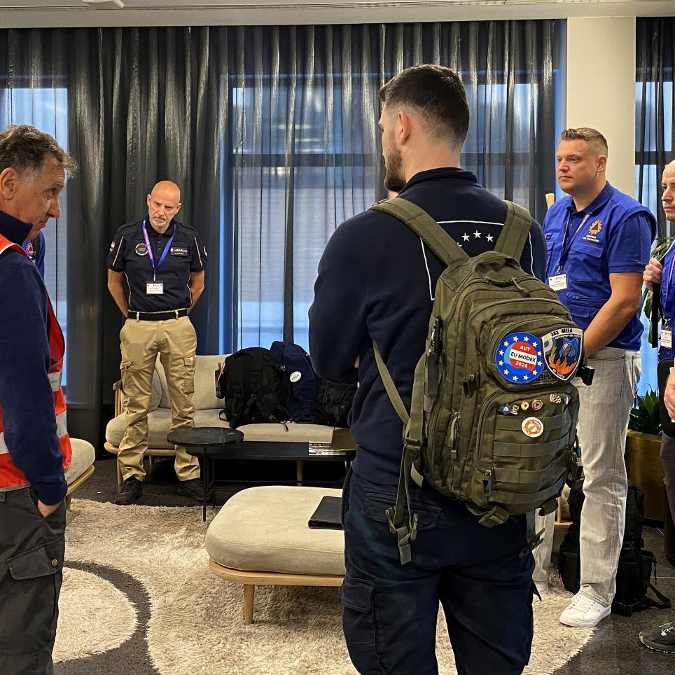 The EUCP Team receives the daily startex briefing from the chief exercise control.