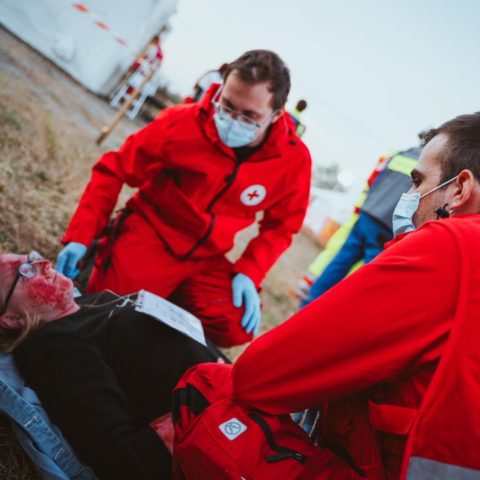 HR EMT members are shown treating a patient.