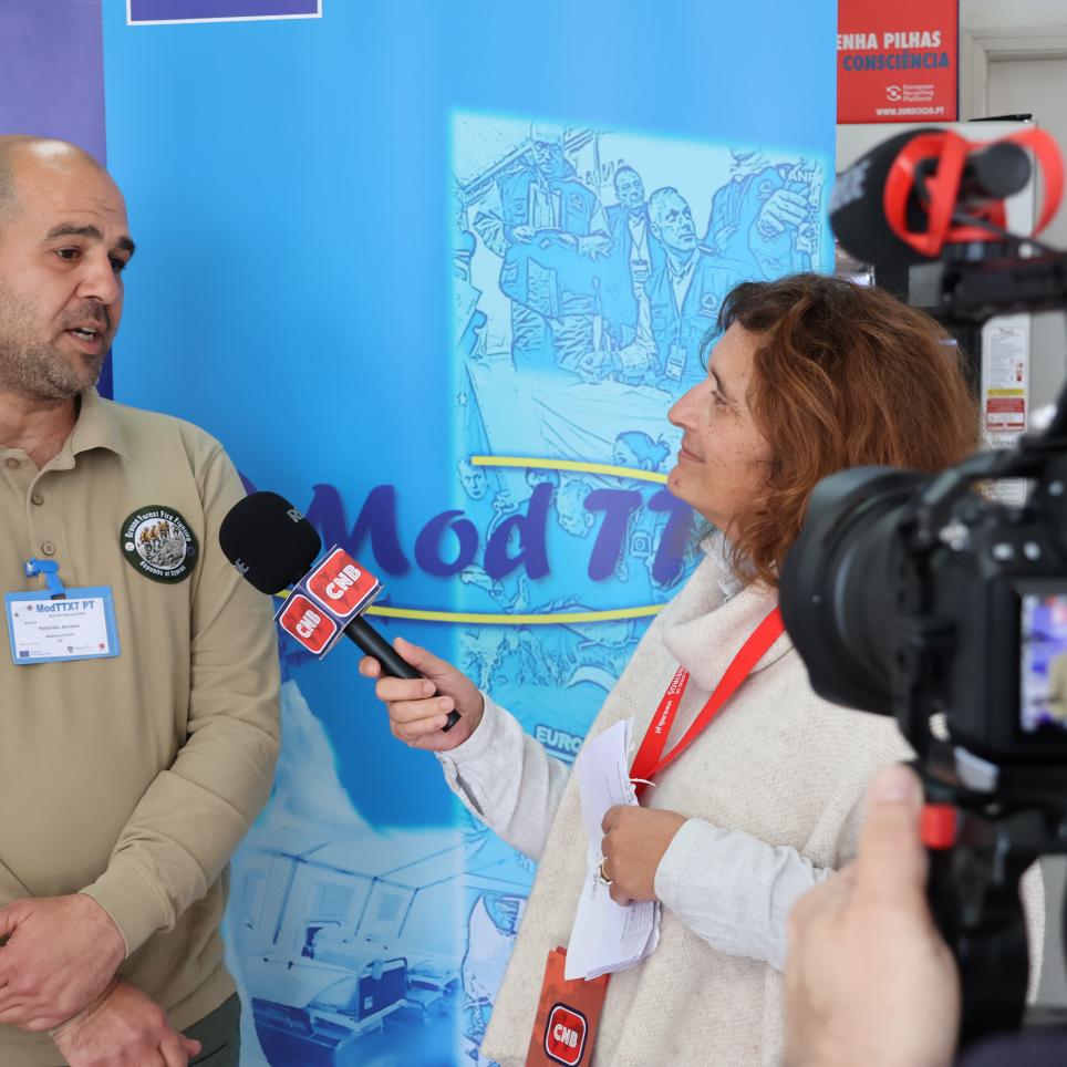 Participants are interviewed by local media (roleplayed in exercise).