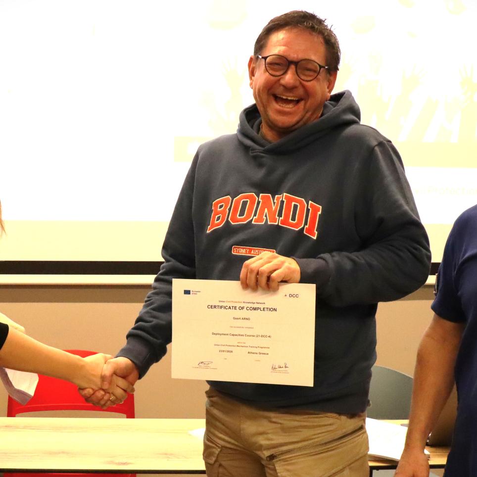 Deployment Capacities Course in Athens: Award Ceremony for Geert Arno from the Netherlands with Eirini Krampi of the Greek Directorate for Civil Protection and DCC Course Director Andreas Hattinger
