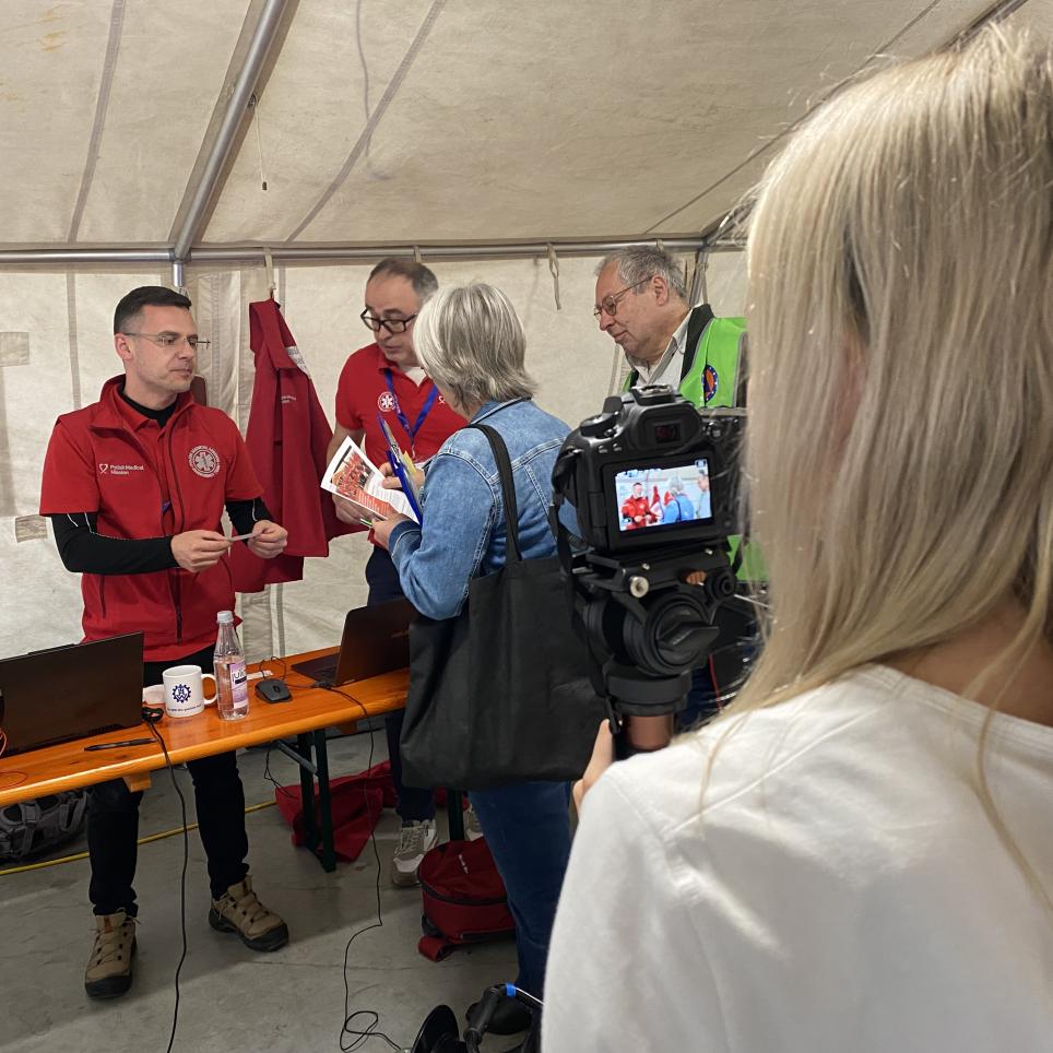 Participants are interviewed by the local media.