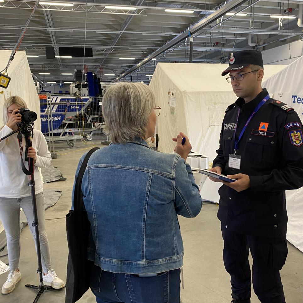 Participants are interviewed by the local media.