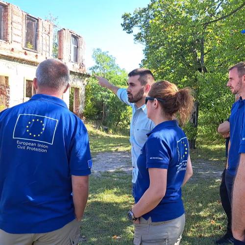 Trainers and consortium experts exploring the training site