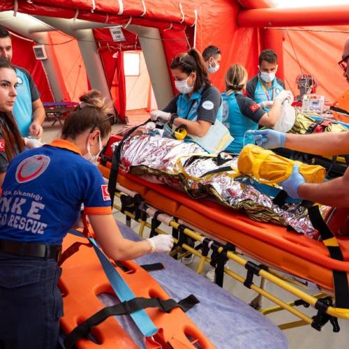 EMT working in a tent © EU MODEX