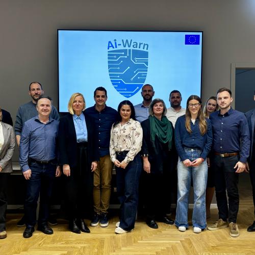 group photo of members of kick off meeting for AI warn project