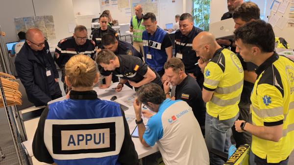 Modules discuss a plan for a joint Base of Operations